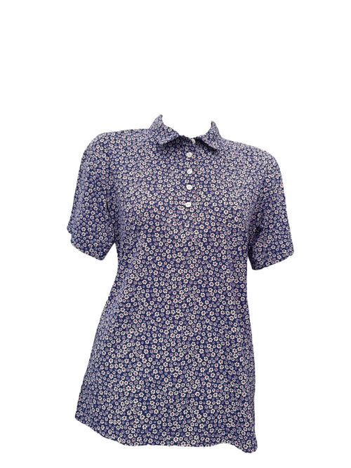 Polo bleu fleurs blanches