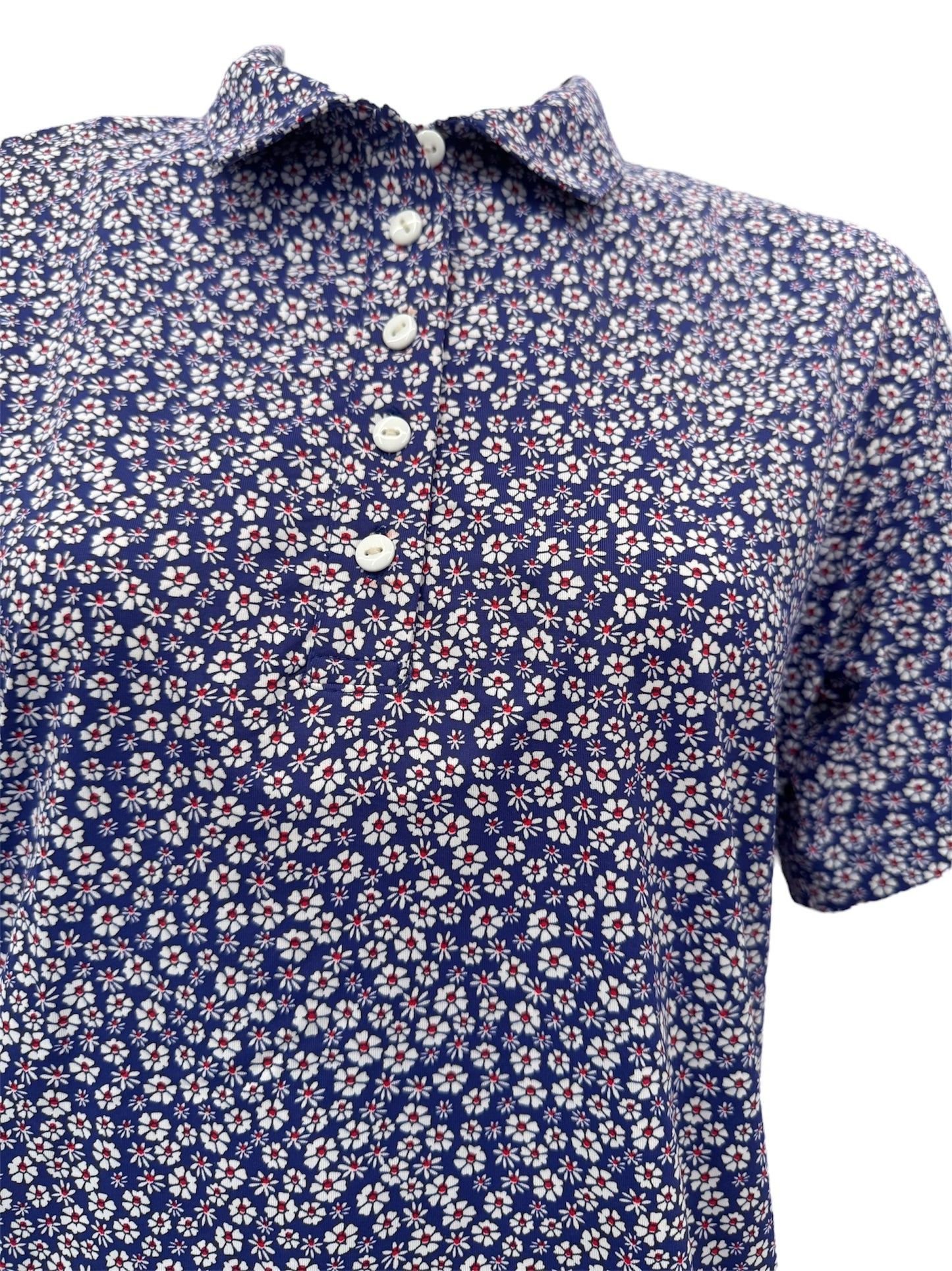 Polo bleu fleurs blanches